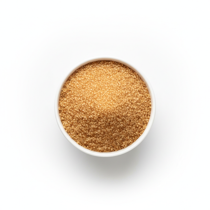 Free flowing granulated brown sugar in white bowl 