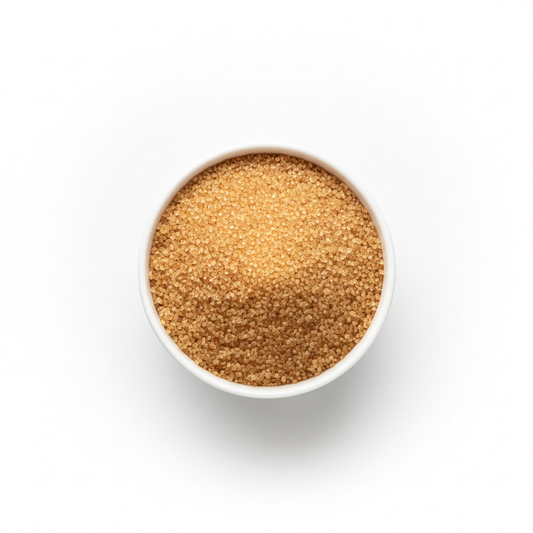 Free flowing granulated brown sugar in white bowl 