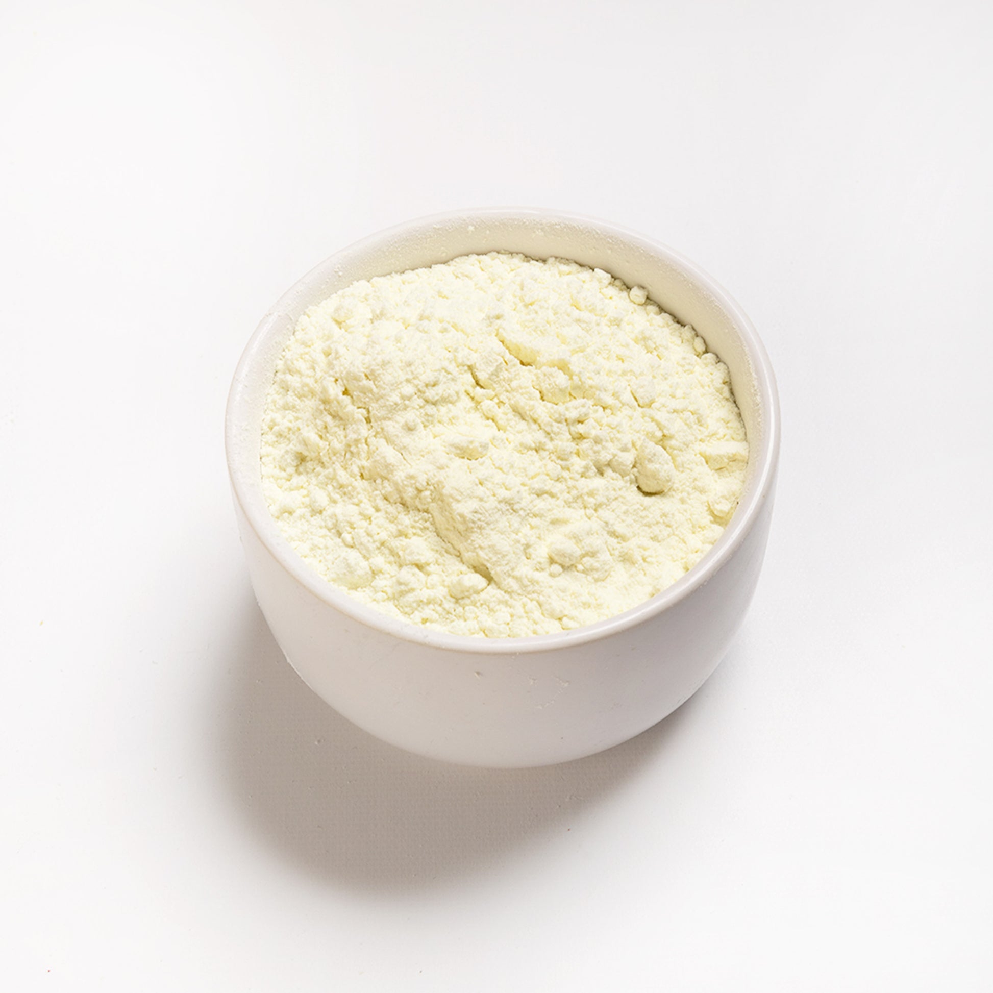 A white bowl filled with RHBULK Buttermilk Powder 
