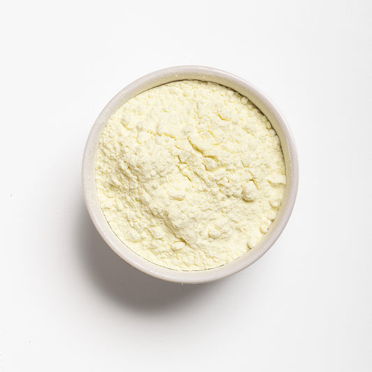 A white bowl filled with RHBULK Buttermilk Powder 