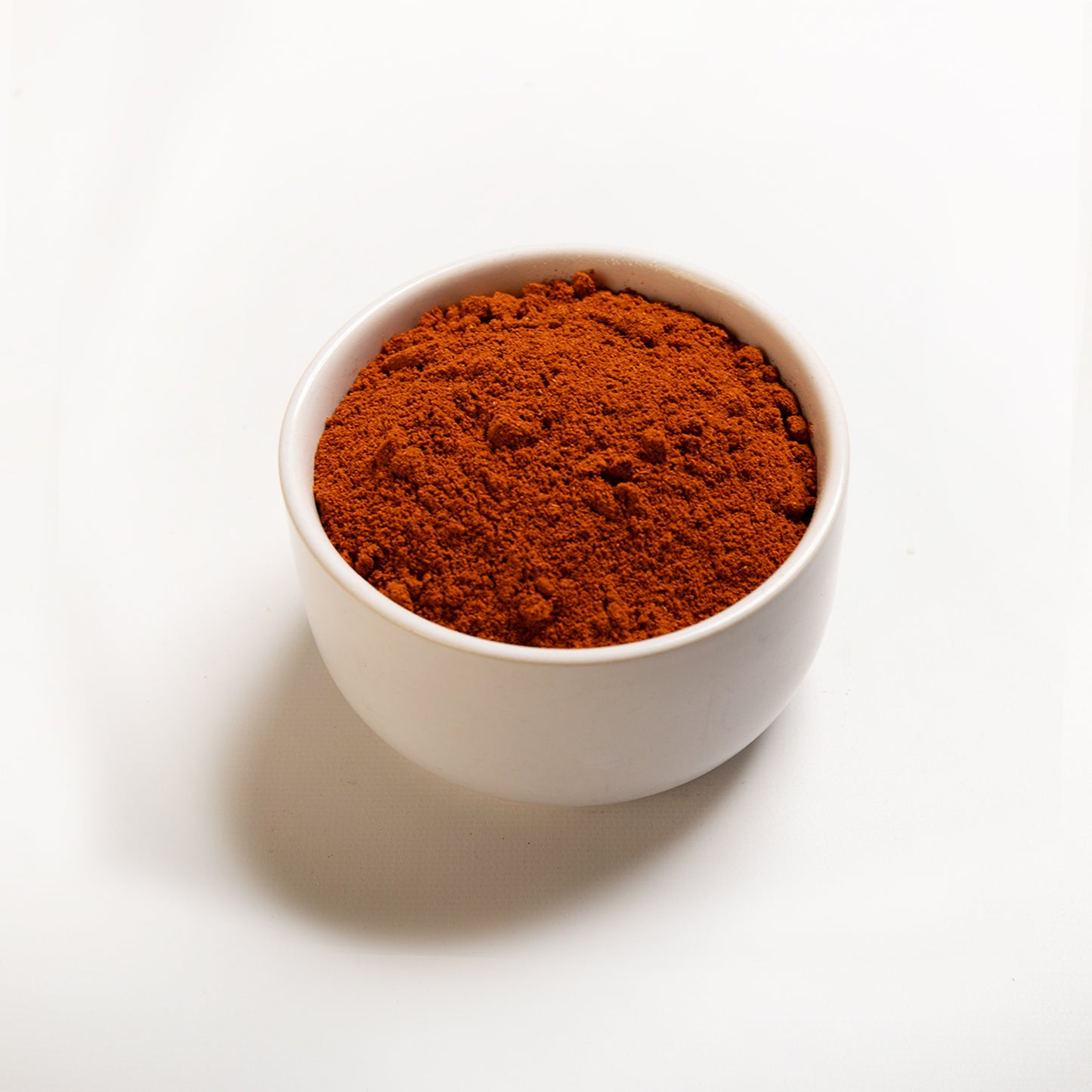 white bowl filled with RHBulk Cayenne Pepper powder