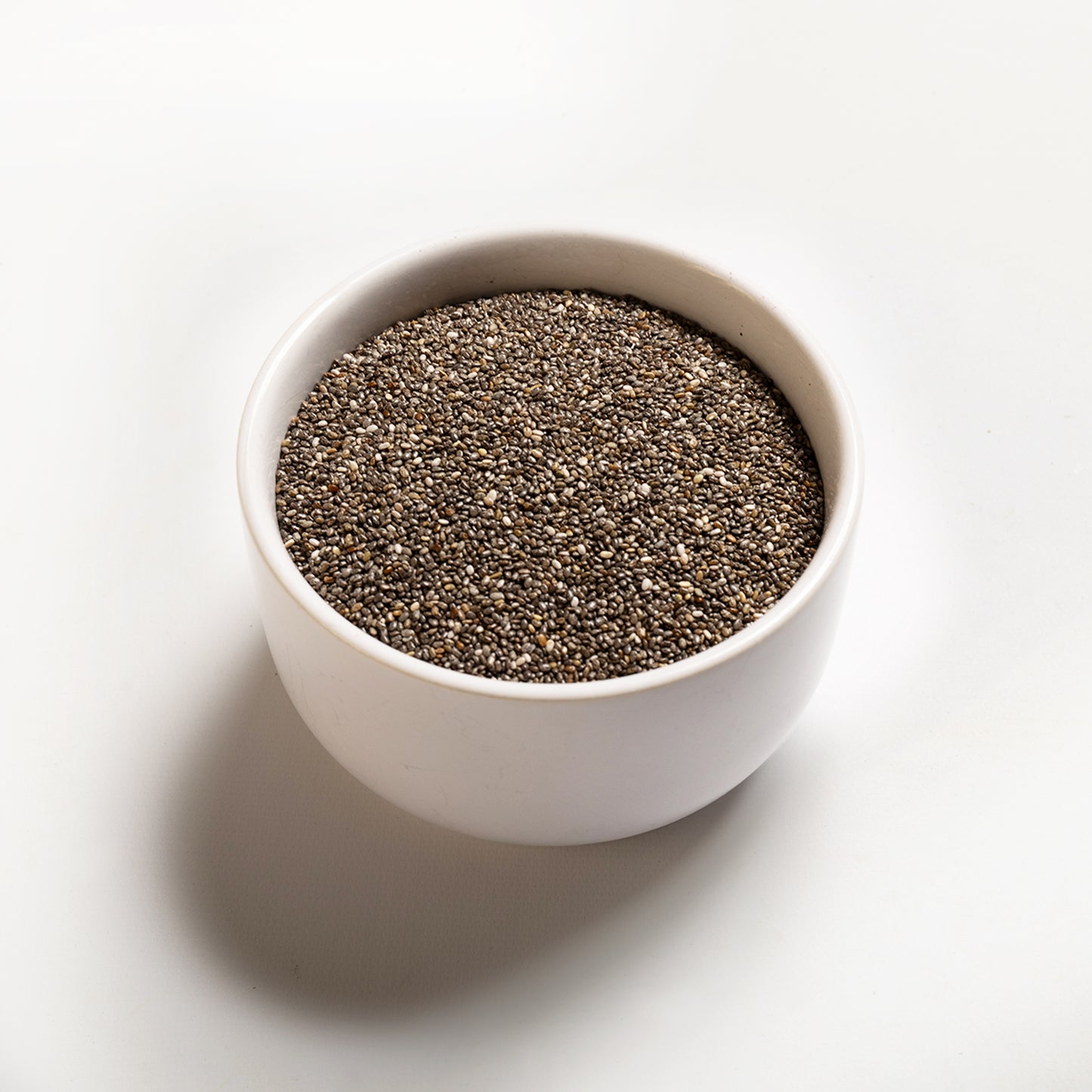 A bowl filled with Organic Chia Seeds from RHBULK 