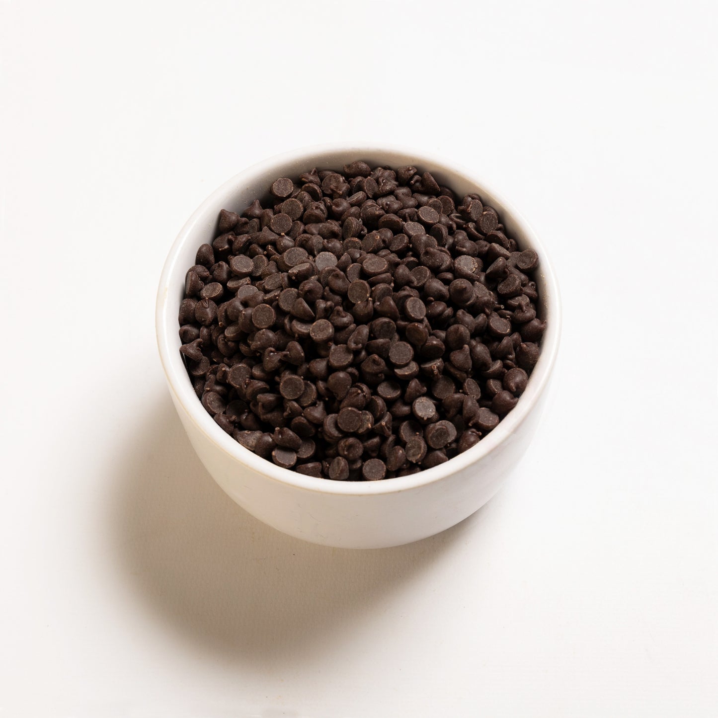 A bowl filled with Dairy Free Chocolate Chips (4000 ct) 