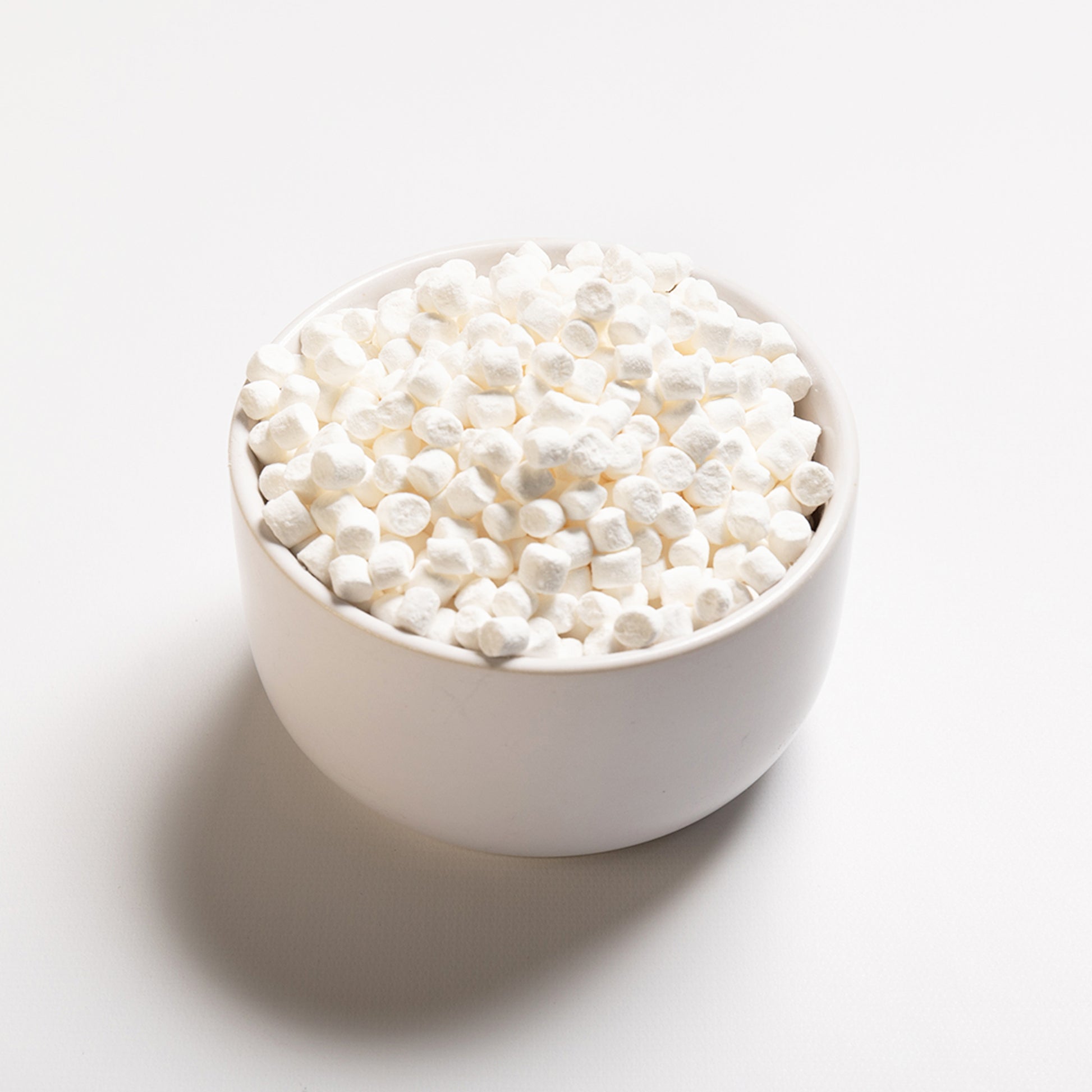 A bowl filled with Dehydrated mini marshmallows from RHBULK 