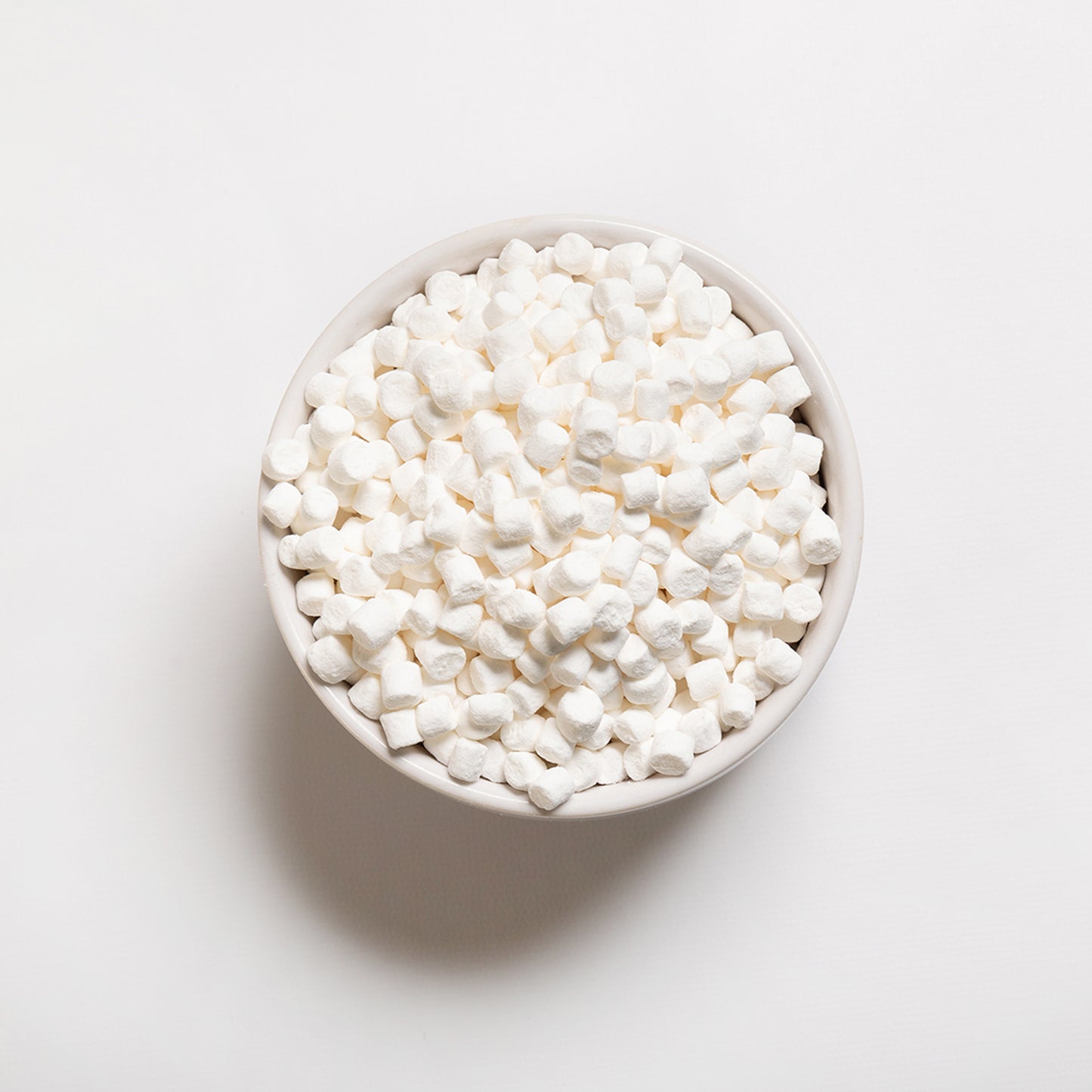 A bowl filled with dehydrated mini marshmallows from RHBULK 