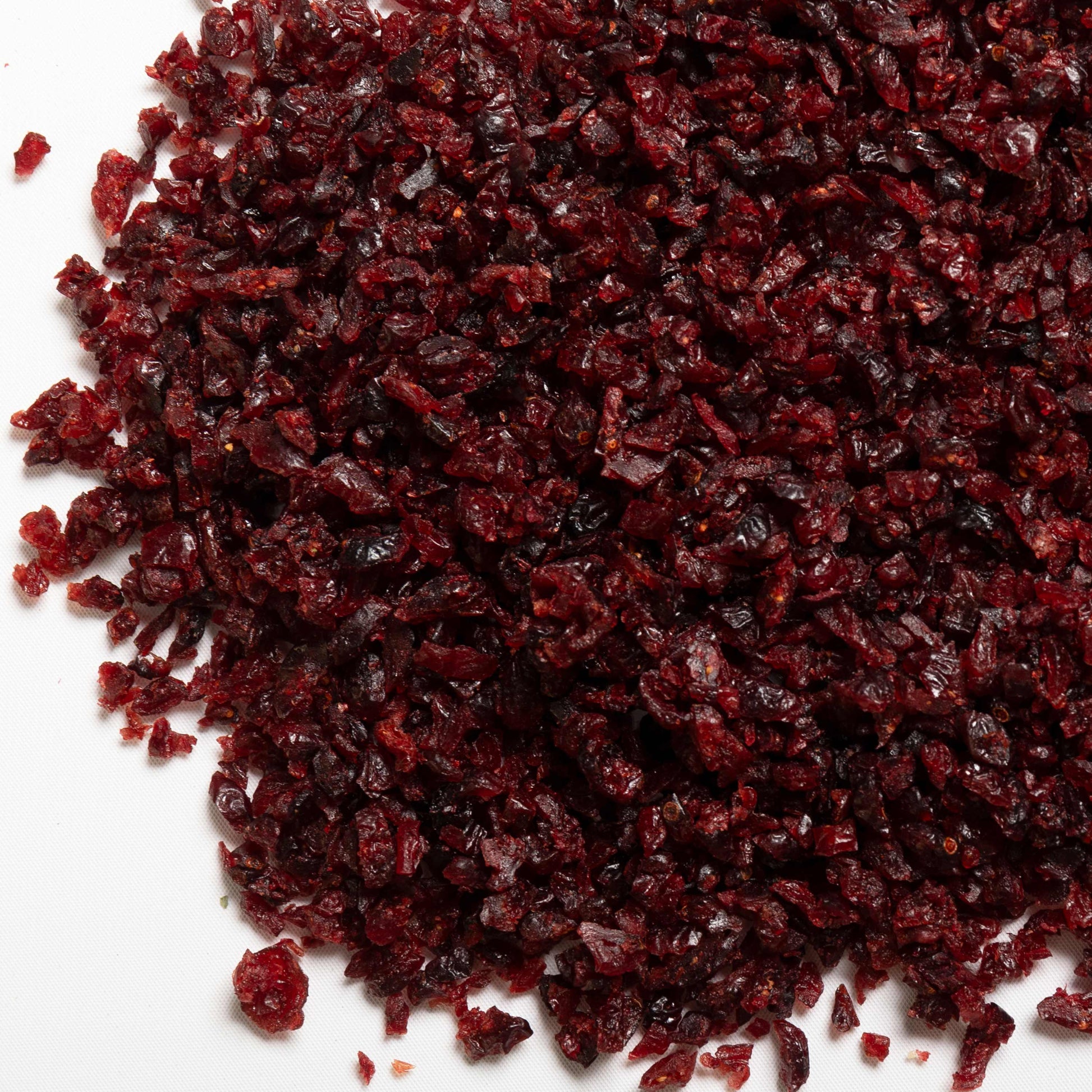 loose product photo of Julienne Cut Sweetened Dried Cranberries showing texture and color 