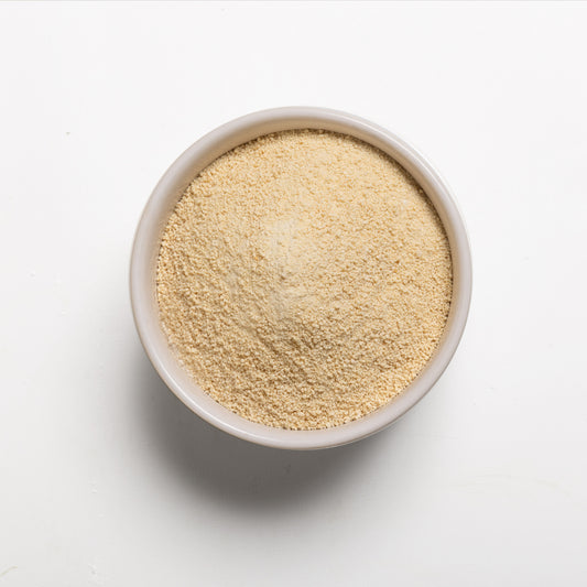 A bowl filled with granulated honey sugar 