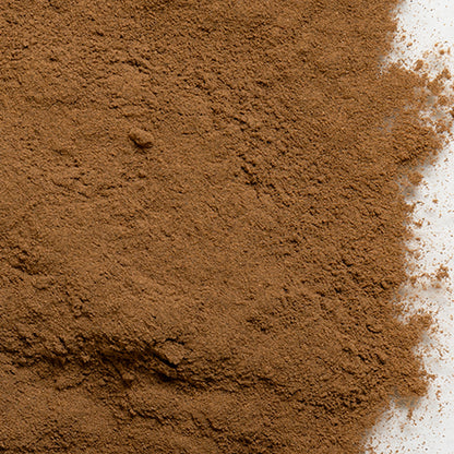 loose product photo of ground allspice showing texture