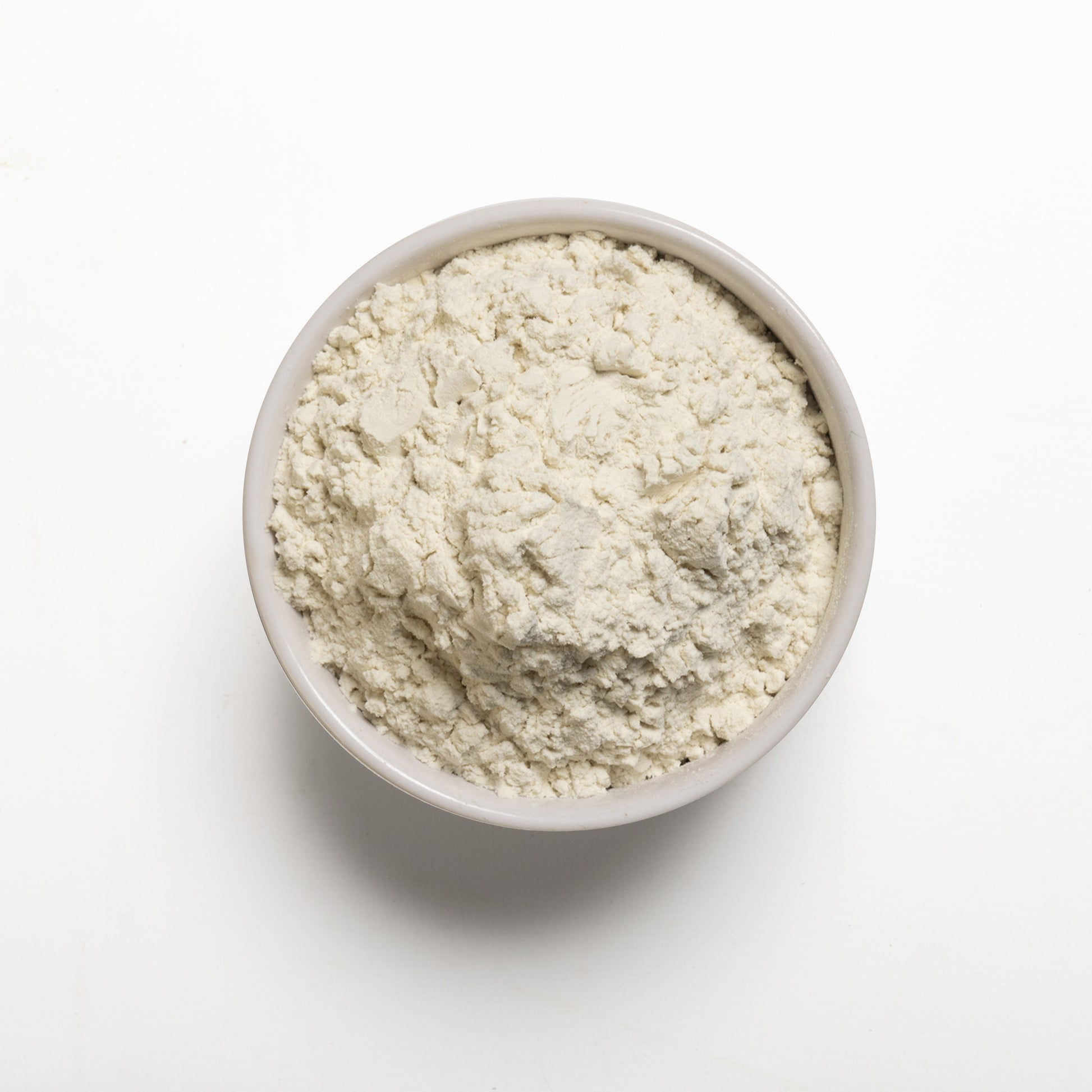White bowl filled with Guar gum powder from RHBulk