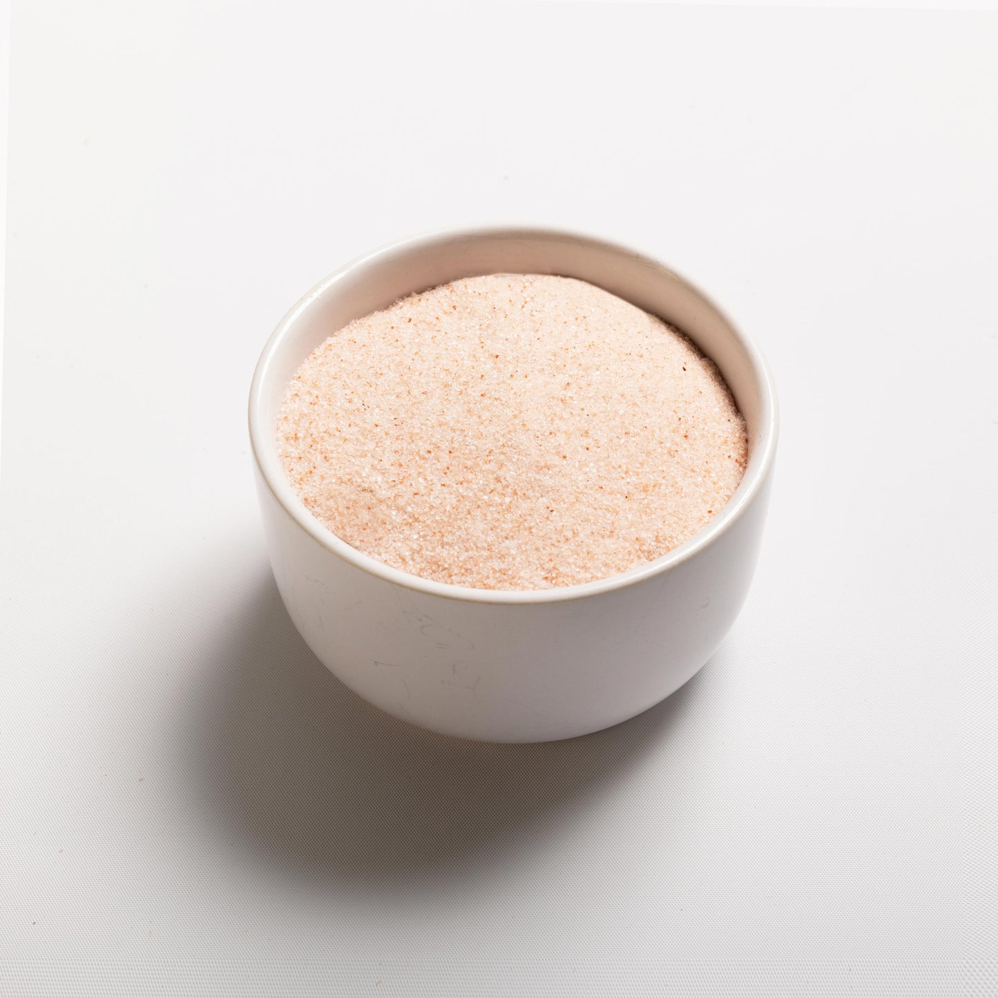 A  bowl filled with Himalayan Pink Salt from RHBULK 