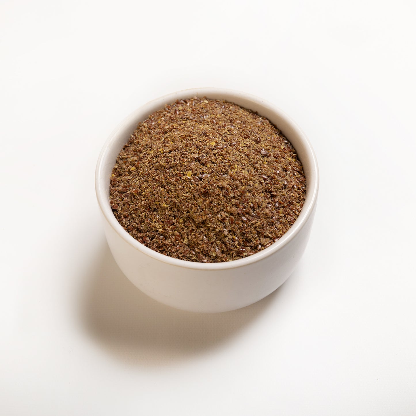 A bowl filled with Milled Brown Flaxseed from RHBULK 