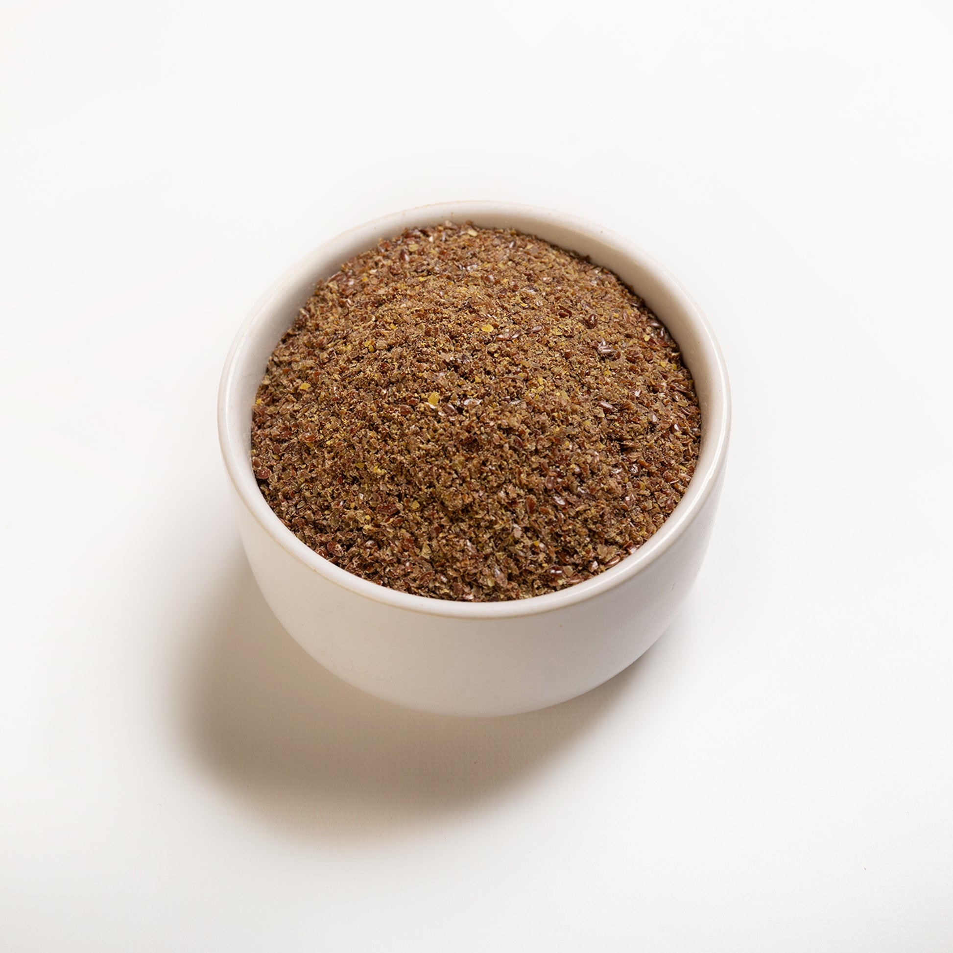 A bowl filled with Milled Brown Flaxseed from RHBULK 