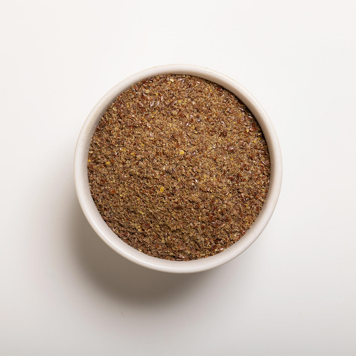 a bowl filled with Milled Brown Flaxseed from RHBULK 