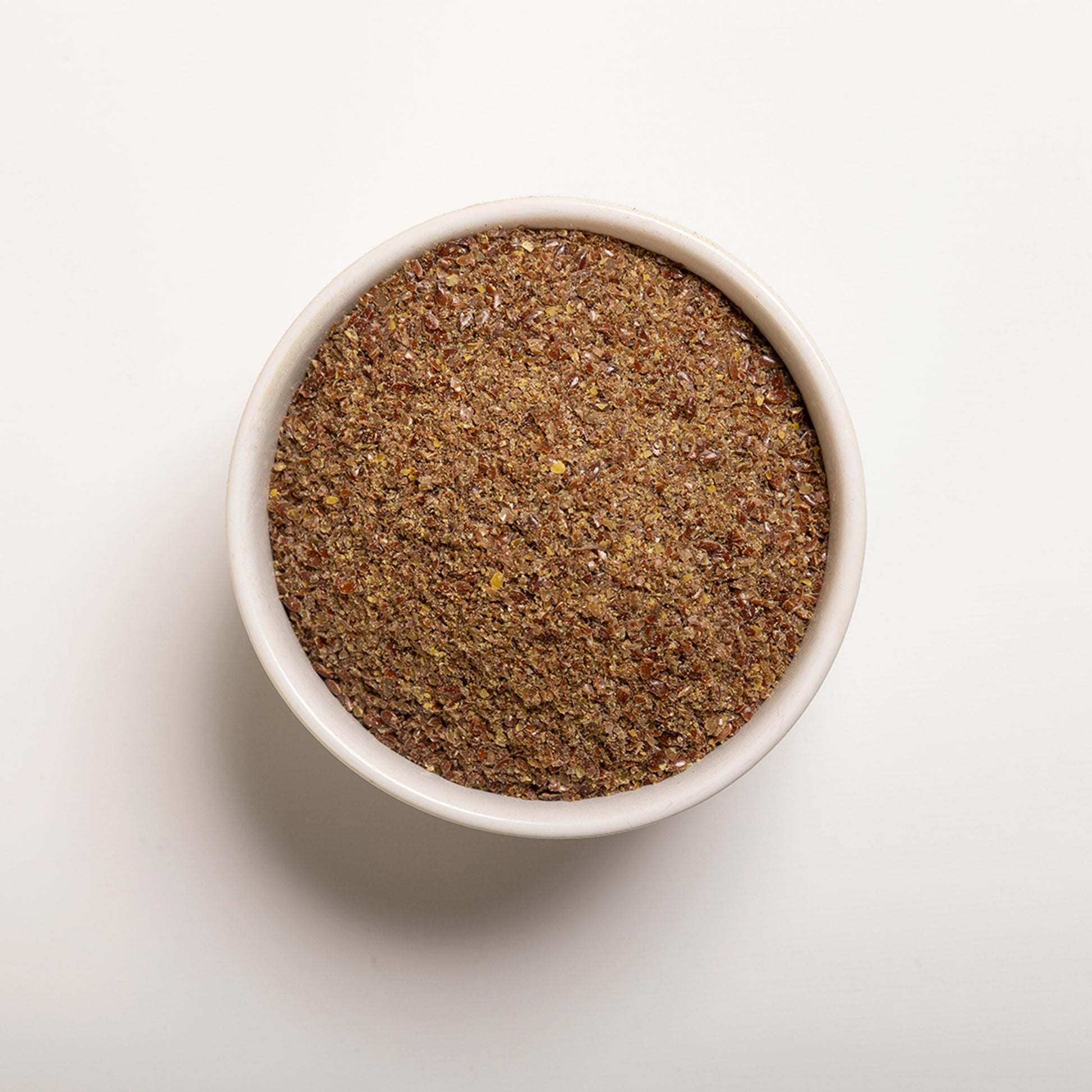 a bowl filled with Milled Brown Flaxseed from RHBULK 