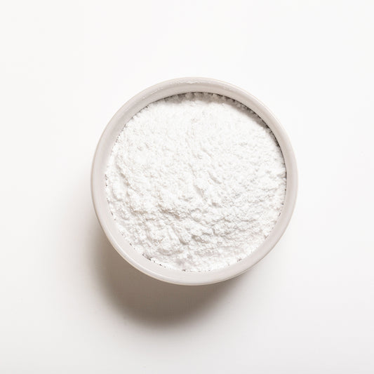 A bowl filled with Monocalcium Phosphate (Monohydrate)