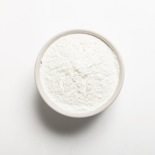 A bowl filled with non-GMO baking powder, made in the USA 