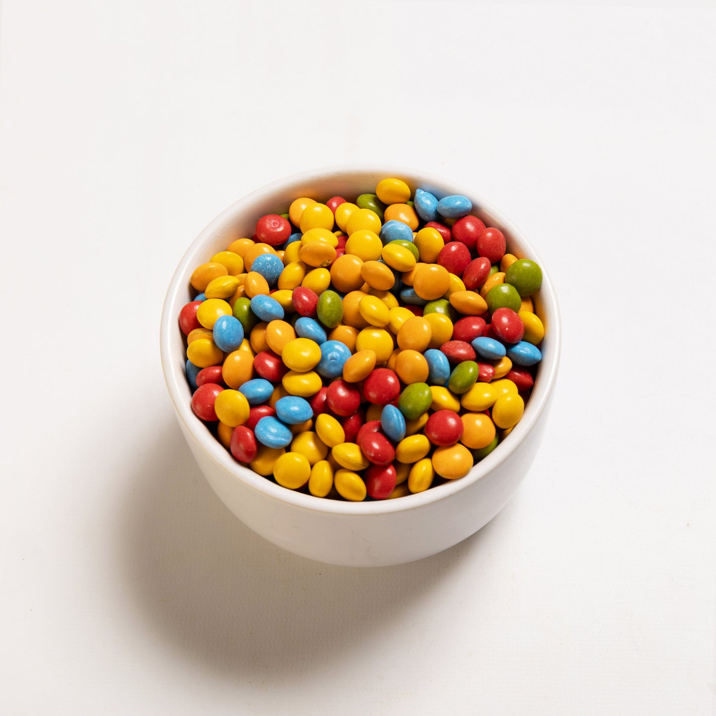Bowl of multi-colored All Natural Semi-Sweet Candy Buddies
