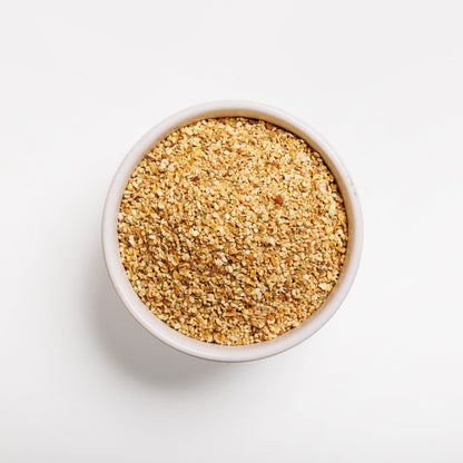 Top view of Orange Peel Granules in a white bowl 