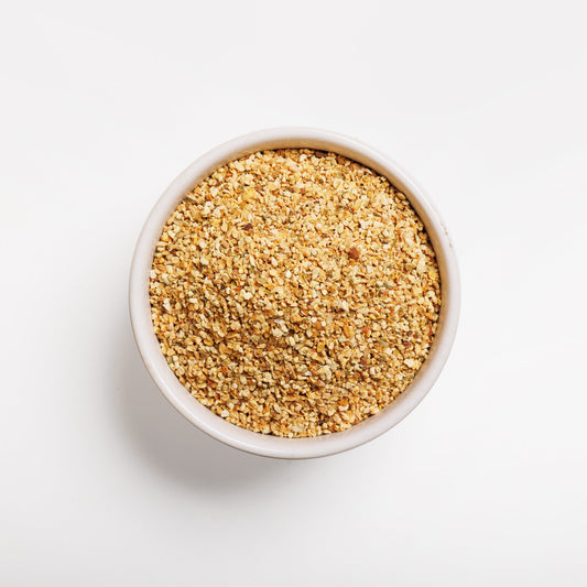 Top view of Orange Peel Granules in a white bowl 