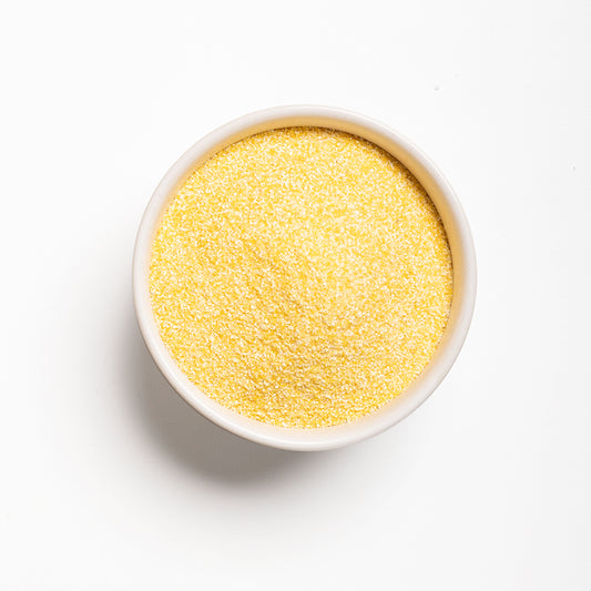 Top view of a bowl filled with Organic Medium Yellow Corn Meal from RHBULK 