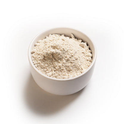 A white bowl filled with RHBULK Organic Oat flour