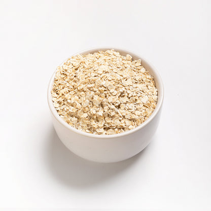A bowl with Organic Rolled Oats on a white background.