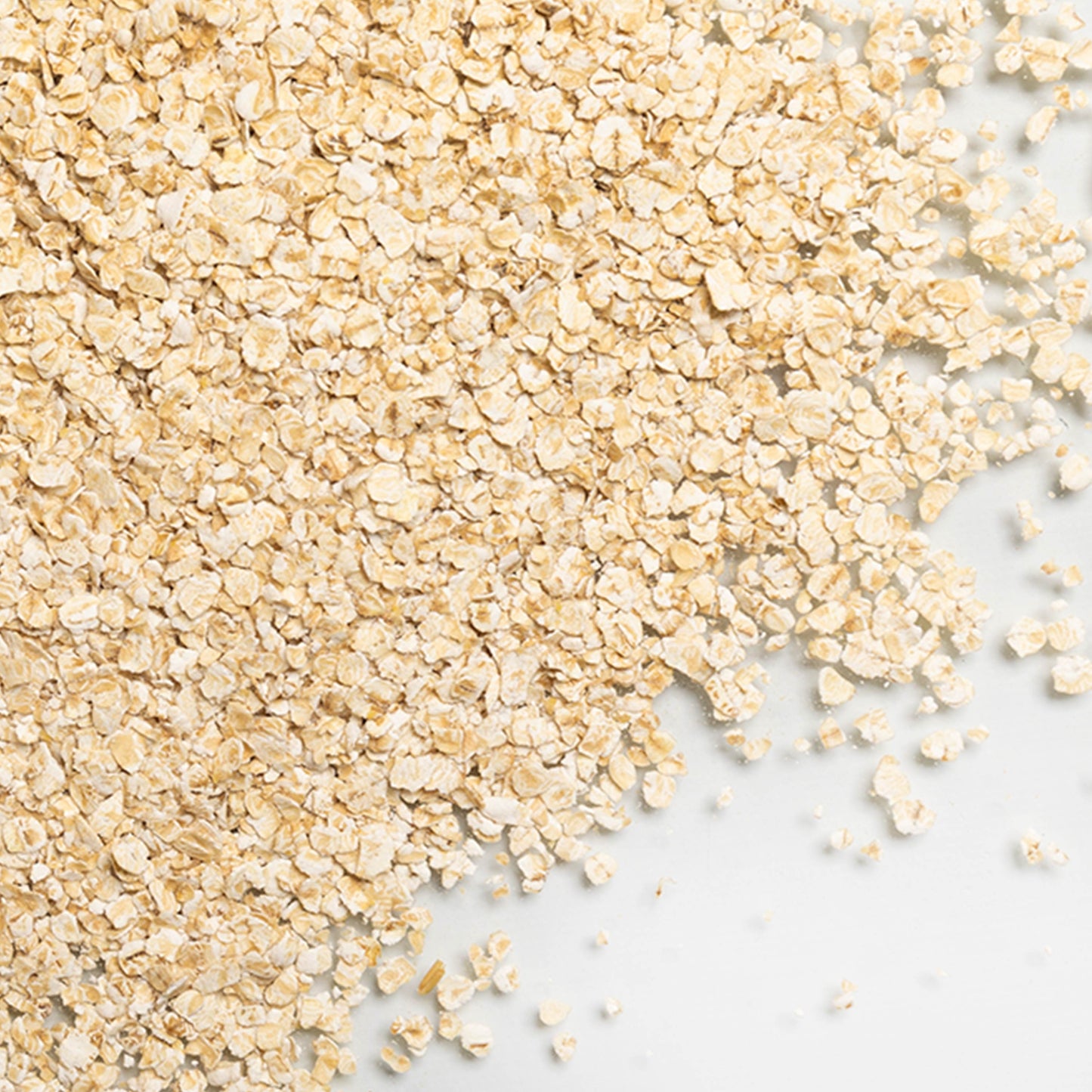 loose product photo of Organic Rolled Oats showing texture and shape 