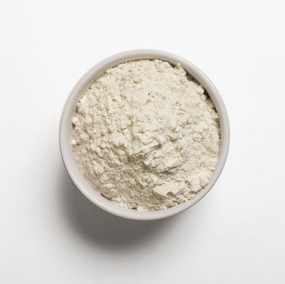 A bowl filled with Organic Gum blend  on a white background