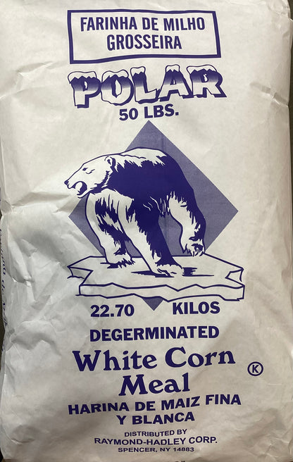 A 50 lbs bag of Polar Degerminated White Corn Meal flour, featuring a dark blue polar bear graphic on a white background.