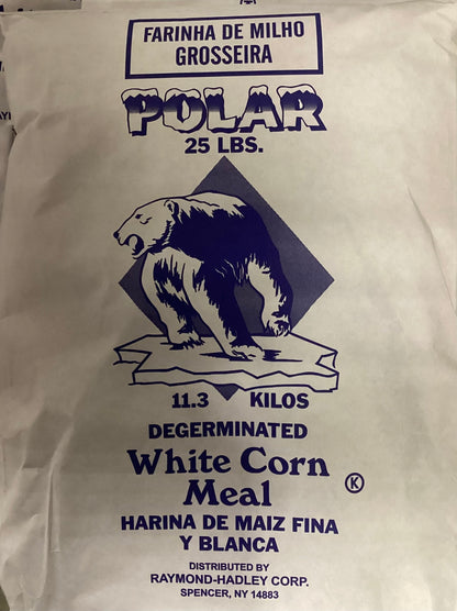 A white paper bag of Polar 25 lbs. Degerminated White Corn Meal, featuring a dark blue graphic of a polar bear on an iceberg with the brand name POLAR and product details.