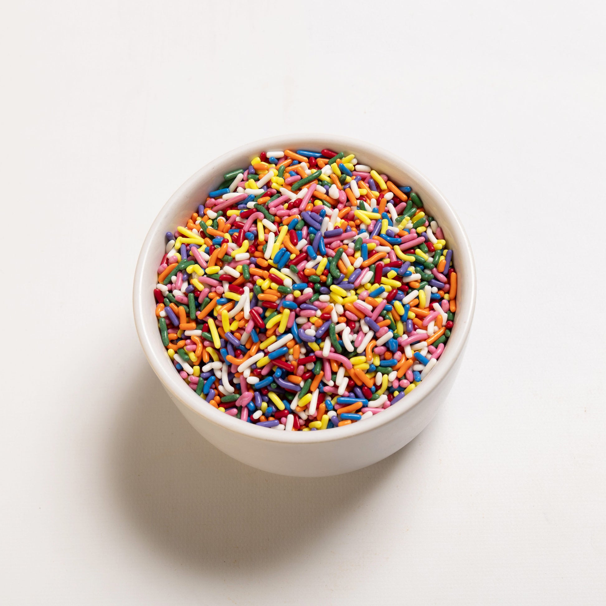 A bowl filled with Rainbow Sprinkles from RHBULK 