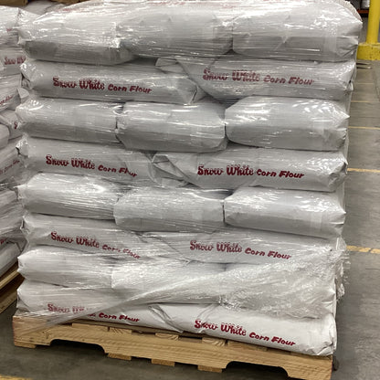 Stack of Snow White Corn Flour bags on a pallet