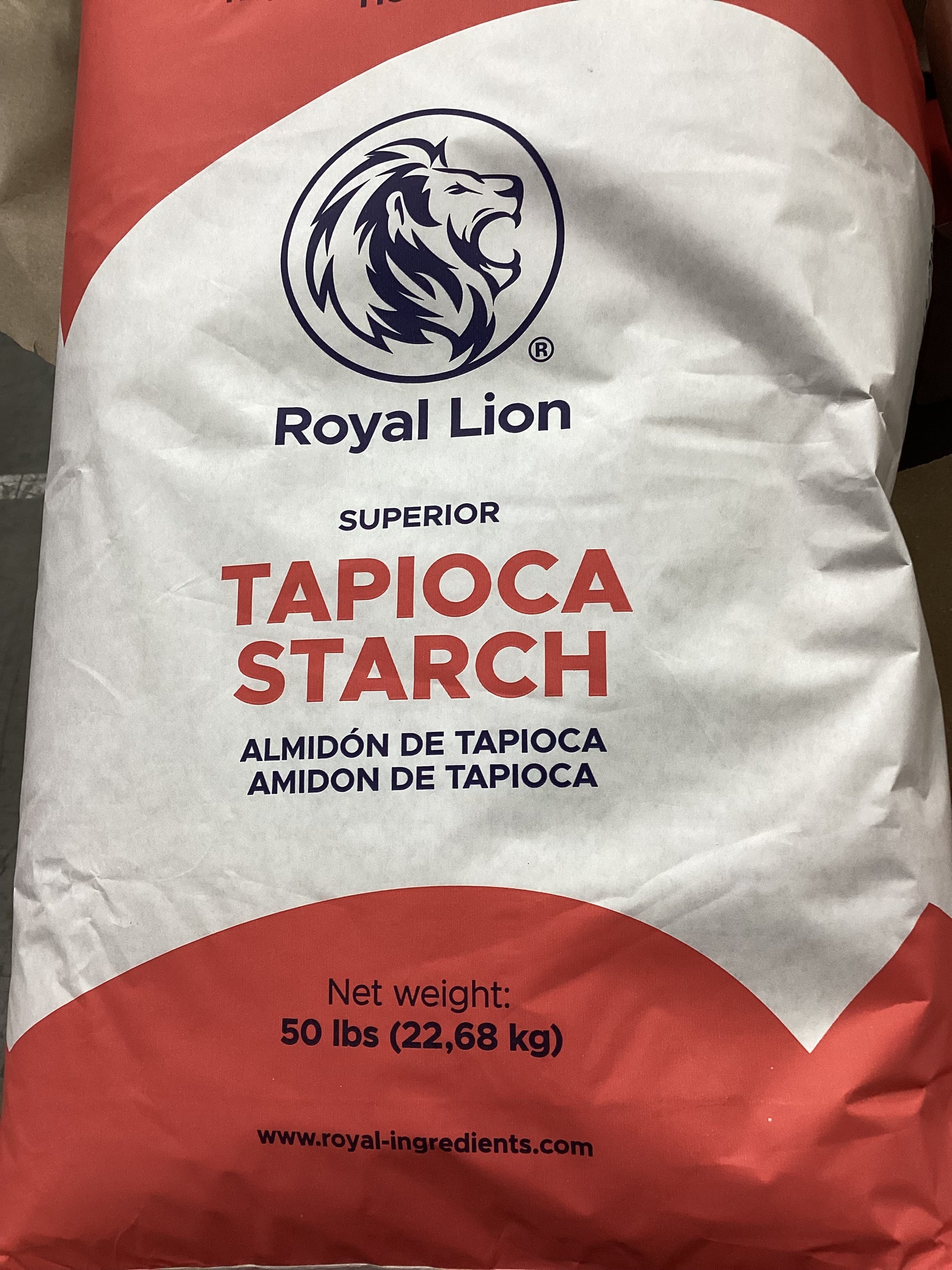 A 50 lb bag of Royal Lion Superior Tapioca Starch, featuring a white bag with red curved accents and black text.