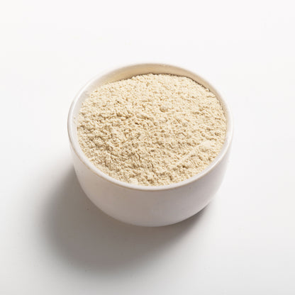 Wheat Protein Isolate in a white bowl at an angle view 