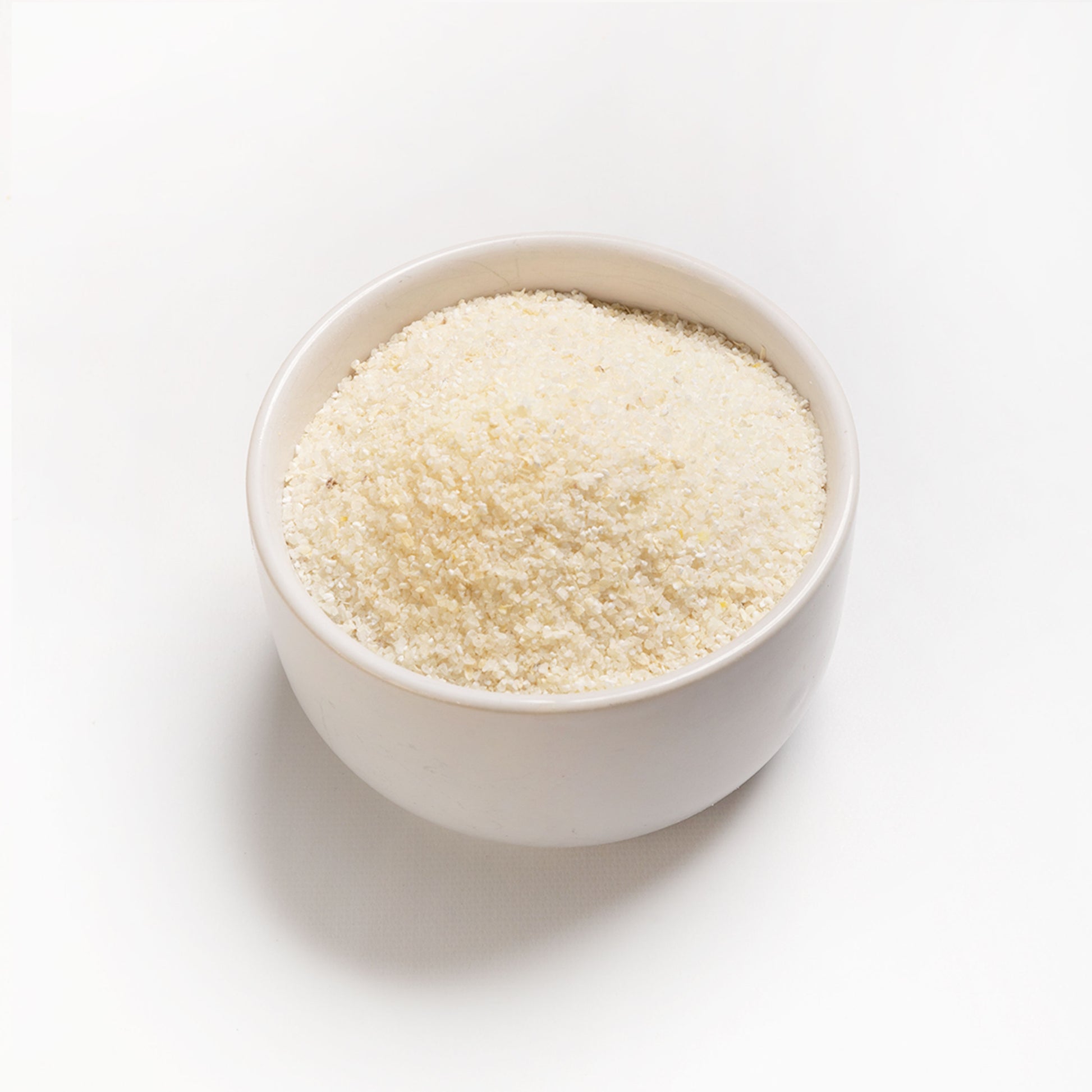 A bowl filled with white snacking grits from RHBULK 
