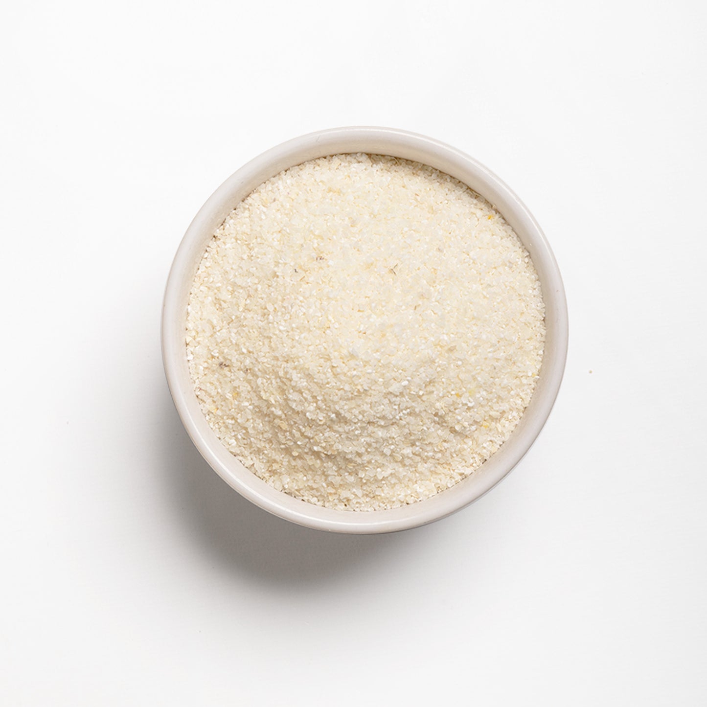 A bowl filled with white snacking grits from RHBULK 