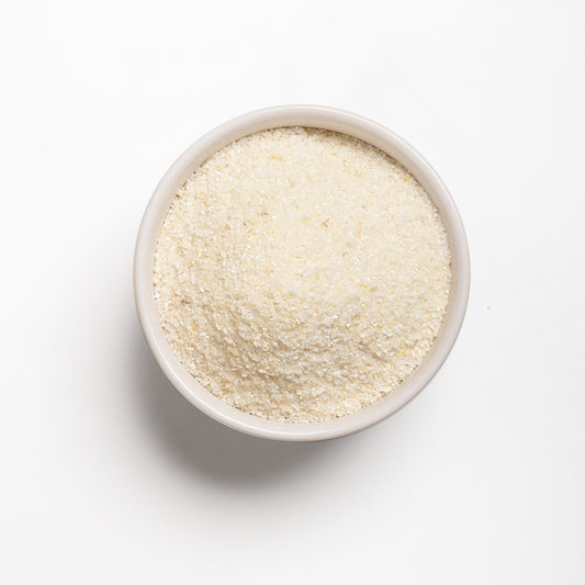 A bowl filled with white snacking grits from RHBULK 