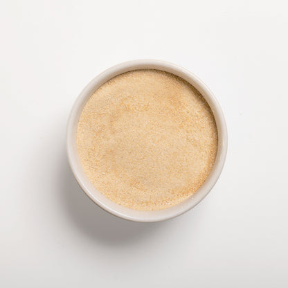 Maple flavor powder in a white bowl 